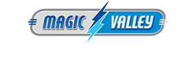 Logo for Magic Valley Electric, featuring the words MAGIC and VALLEY separated by a blue lightning bolt, with a stylized blue and gray rectangular background.