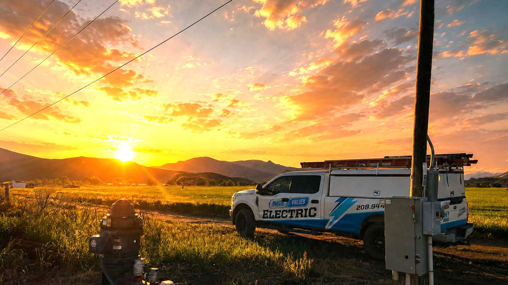 MVE truck in the field at sunset